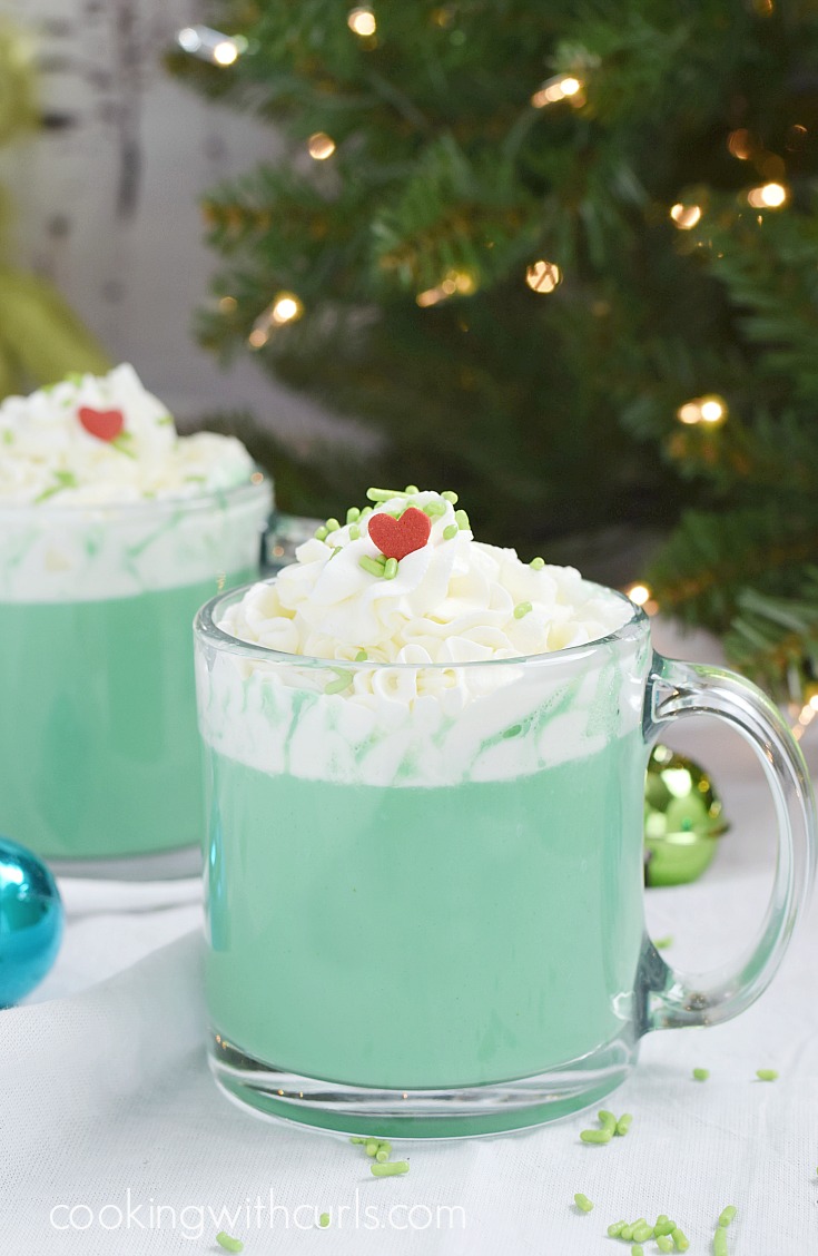 Grinch Hot Cocoa! 25+ easy Christmas treats you can make with your kids this holiday season! Christmas treats and holiday treats are a must for Christmas party recipes. 